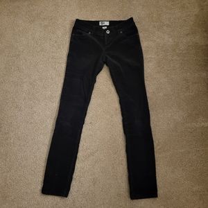 Black corduroy skinny leg pants